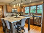 The kitchen has plenty of counterspace and a beautiful island